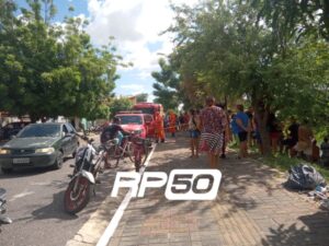 Corpo de Bombeiros e populares à beira da lagoa